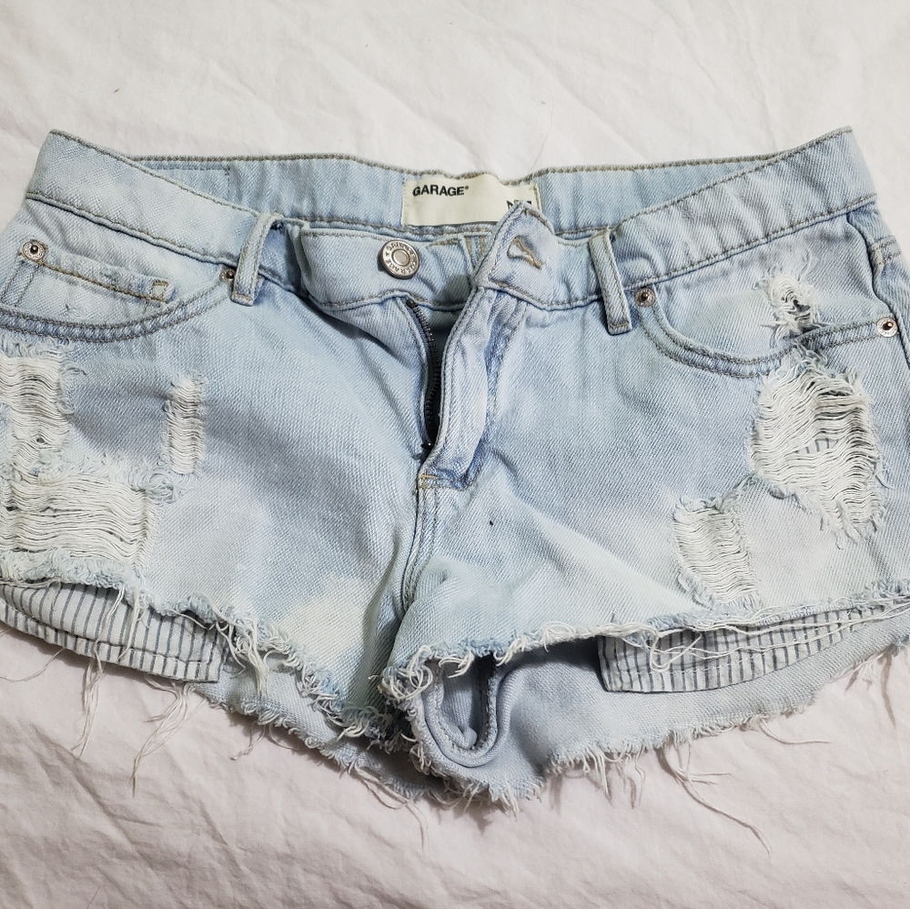 Garage distressed light wash denim shorts